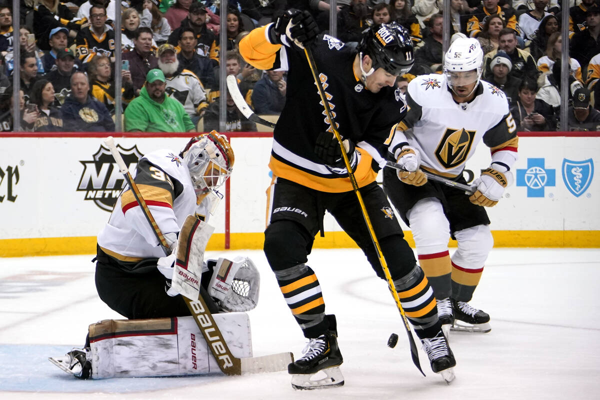 Pittsburgh Penguins' Brian Boyle (11) can't get his stick on a rebound in front of Vegas Golden ...