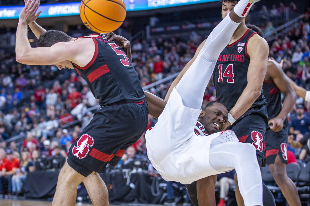 Stanford Cardinal guard Michael O'Connell (5) and Arizona Wildcats guard Bennedict Mathurin (0) ...
