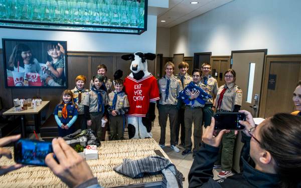 Boy Scout Troop 314 members are on hand as the new Chick-Fil-A opens complete with a ribbon cut ...