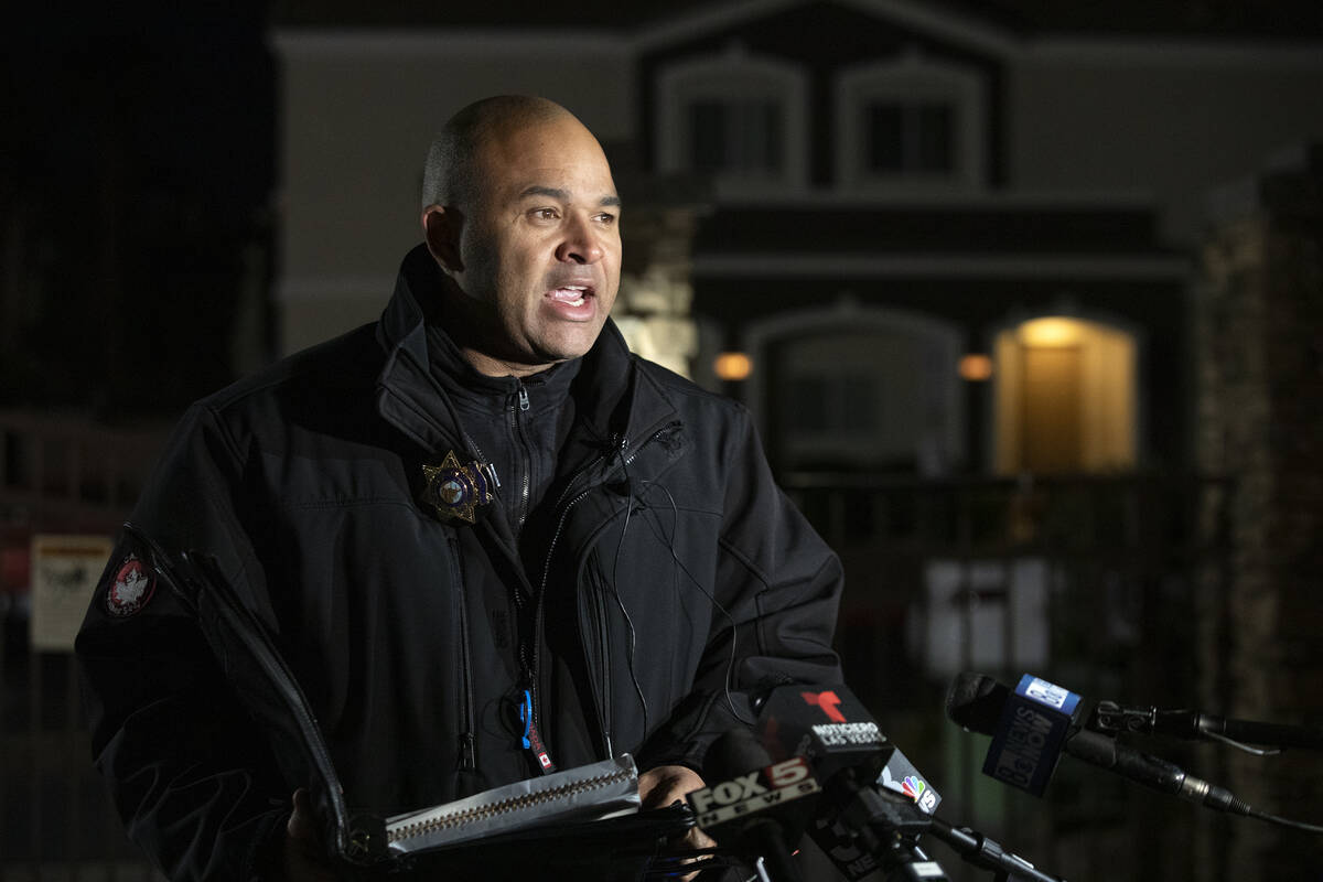 Lt. Ray Spencer gives a briefing to the media on the investigation of a homicide at a gated apa ...