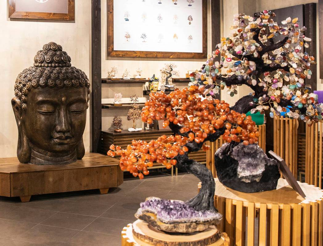Handmade trees, known as Feng Shui Tree of Life, are displayed at Karma and Luck retail store o ...