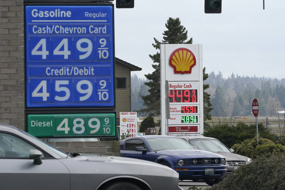 Gas prices are shown Monday, March 7, 2022, in Tumwater, Wash. Governors and state lawmakers ac ...