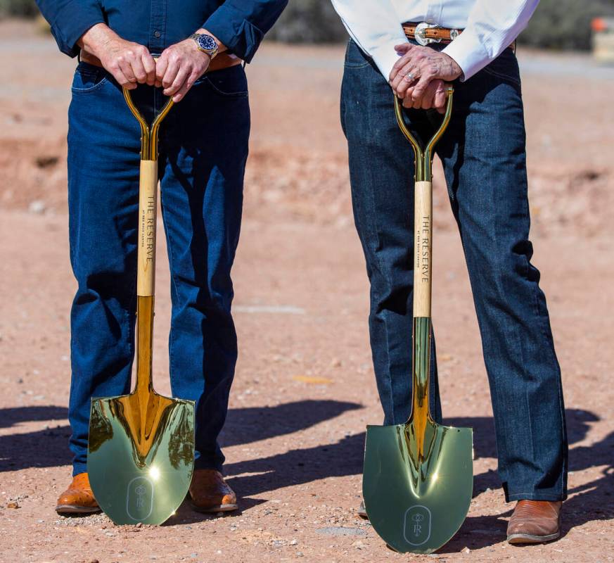 Joel Laub, left, and Randall Jones with groundbreaking shovels about The Reserve at Red Rock Ca ...