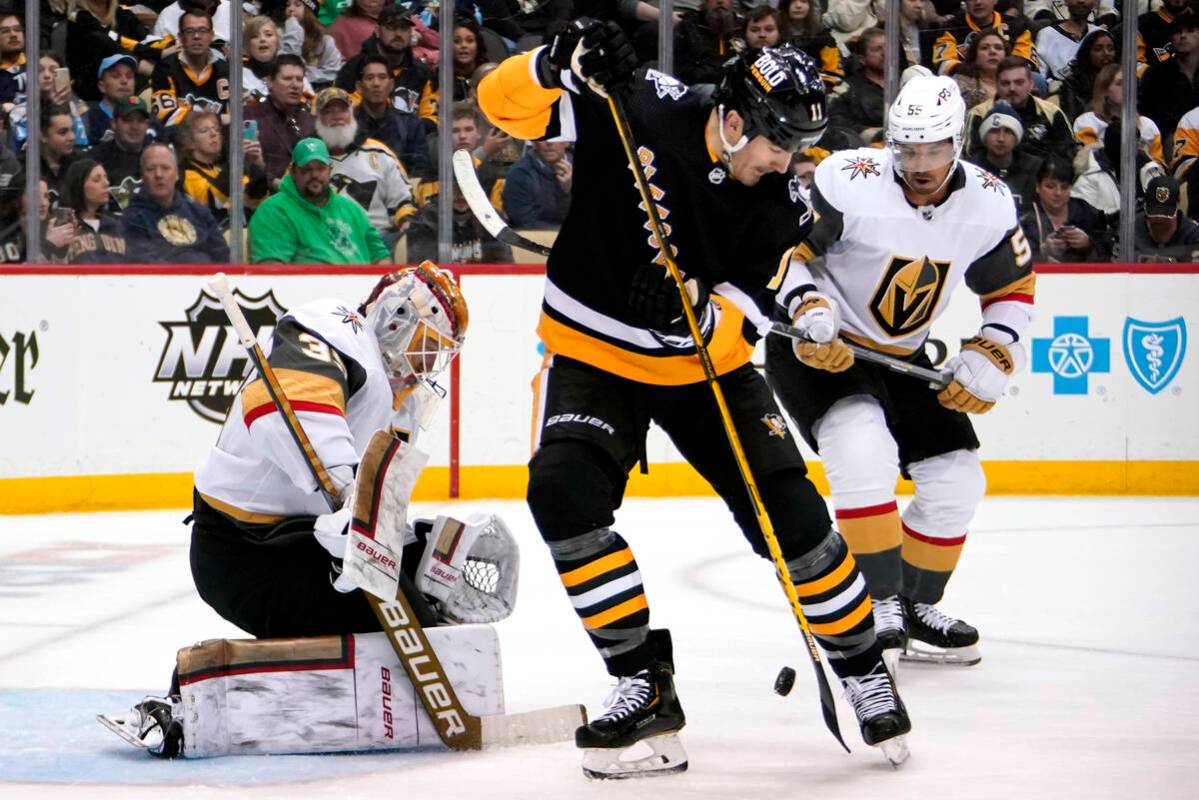 Pittsburgh Penguins' Brian Boyle (11) can't get his stick on a rebound in front of Vegas Golden ...