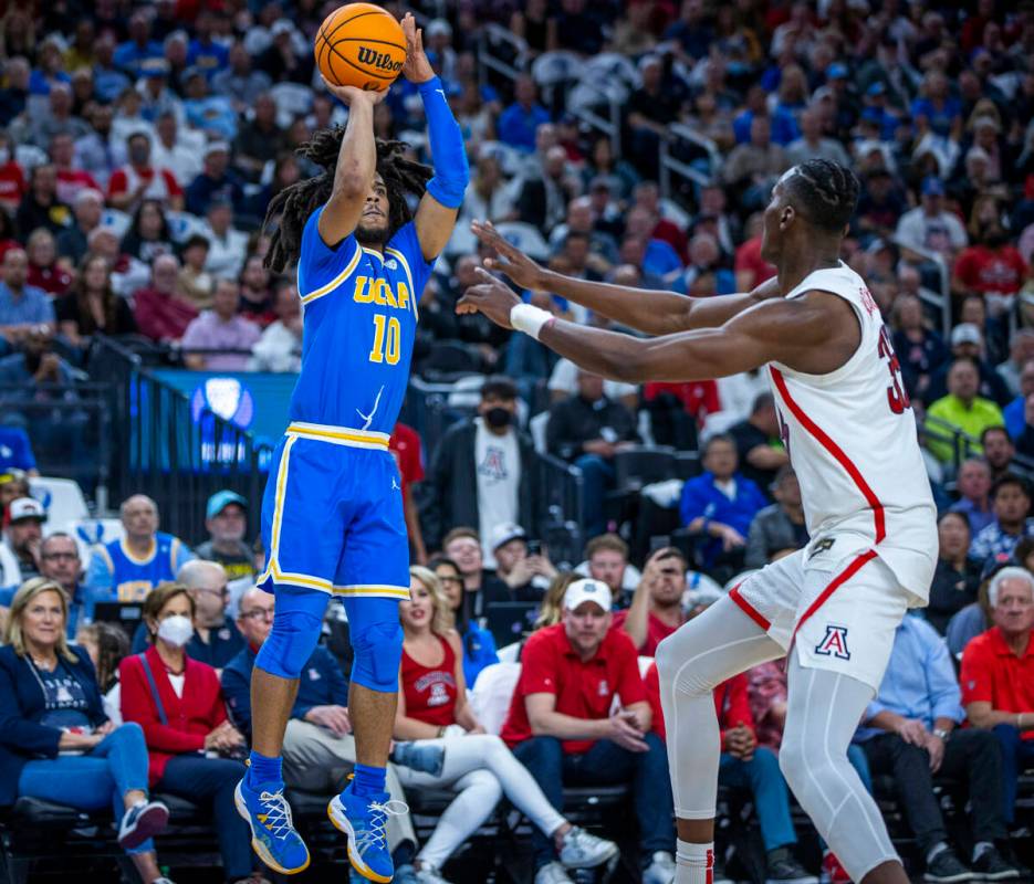 UCLA Bruins guard Tyger Campbell (10) elevates for a three-point basket over Arizona Wildcats c ...