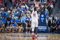 Arizona Wildcats center Oumar Ballo (11) celebrates their win over the UCLA Bruins 84-76 follow ...