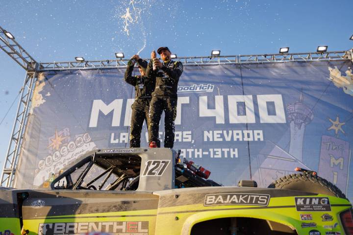 Kyle Jergensen of Perris, California, and navigator Shawn Shanks celebrate their victory in Sat ...