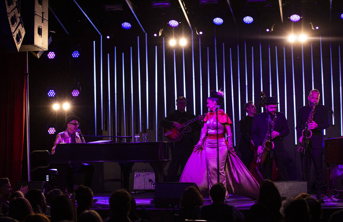 Jeff Goldblum, left, performs with Melody Sweets, center right, and the Mildred Snitzer Orchest ...