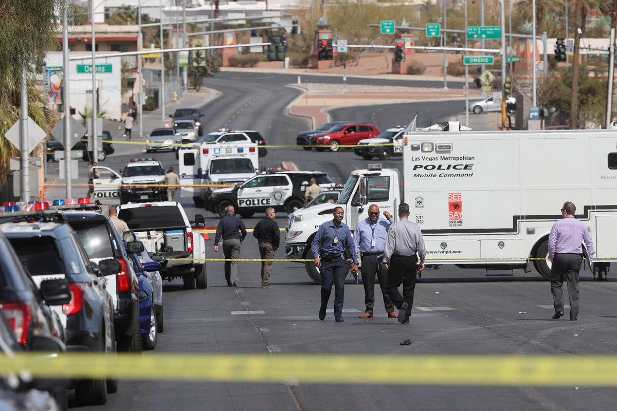 Las Vegas police investigate an officer-involved shooting near North Main Street and Foremaster ...