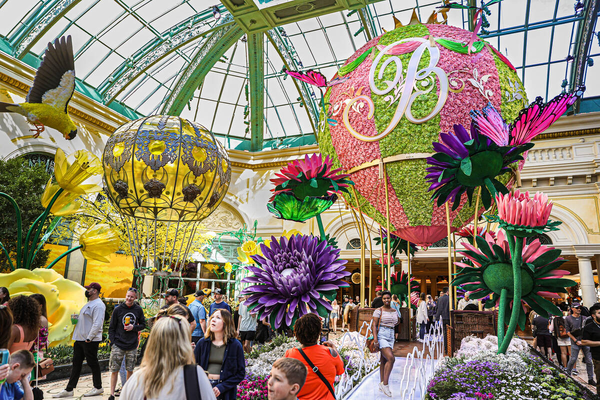 Visitors enjoy the new spring display “Flights of Fancy” at the Bellagio Conservatory on Mo ...