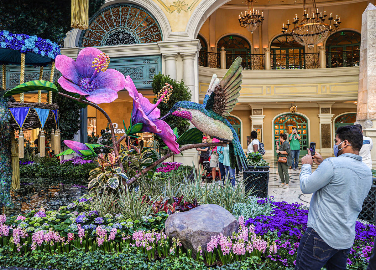 Visitors enjoy the new spring display “Flights of Fancy” at the Bellagio Conserva ...