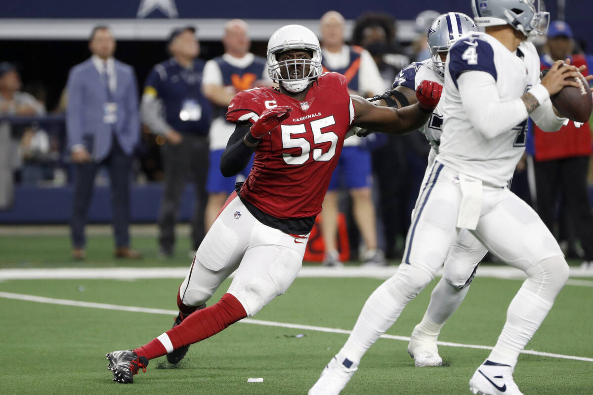 Arizona Cardinals outside linebacker Chandler Jones (55) rushes Dallas Cowboys quarterback Dak ...