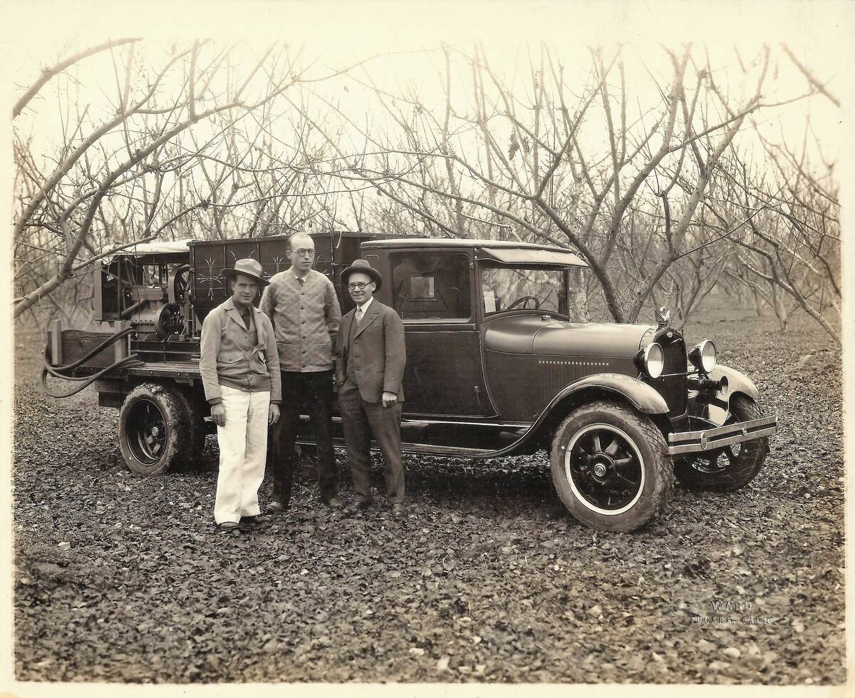 George Gaudin and others pose in front of a Model A truck in an undated photo. (Gaudin Motor Co ...