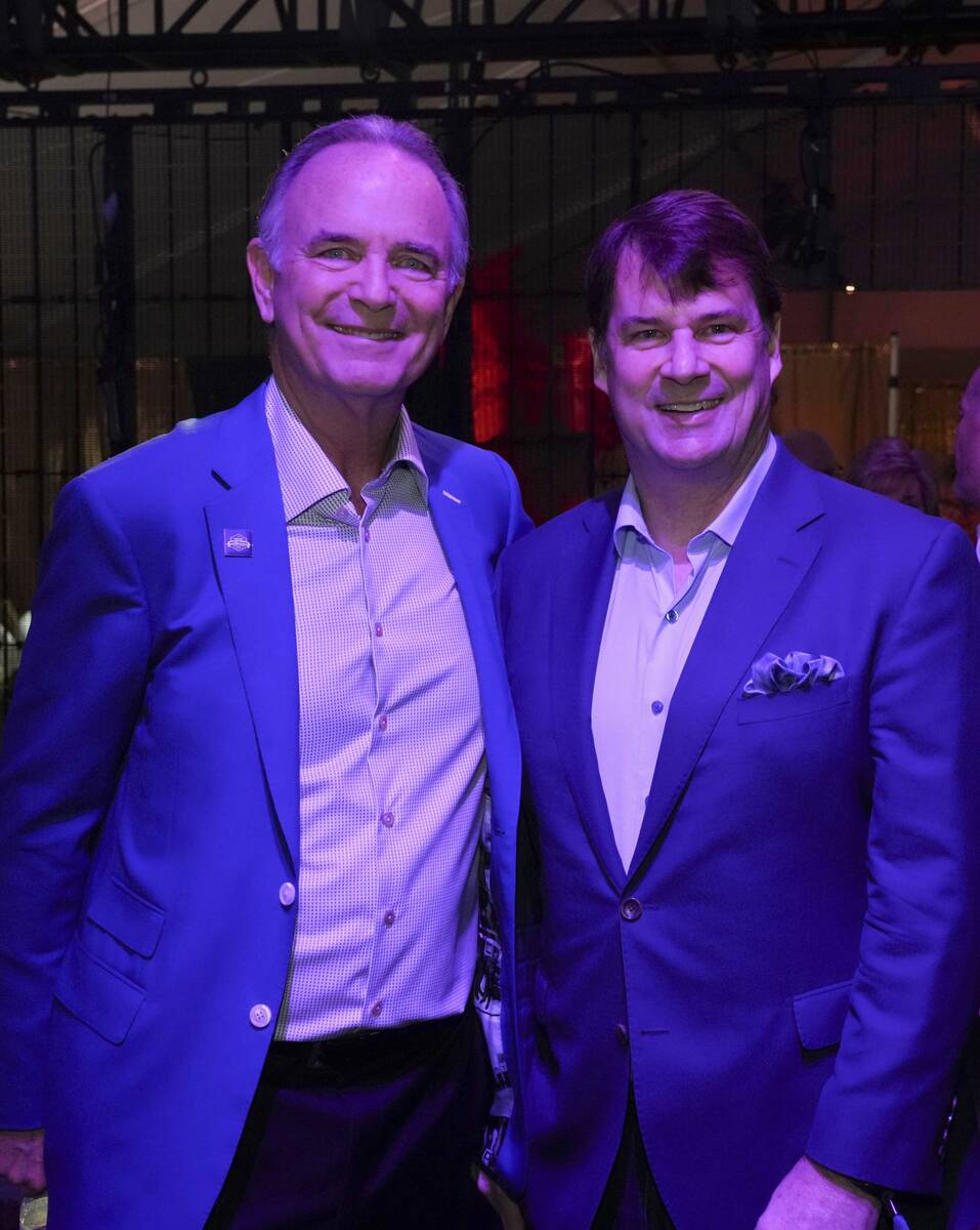 Gary Ackerman, left, poses for a photo with Ford Motor Company CEO Jim Farley at a celebration ...