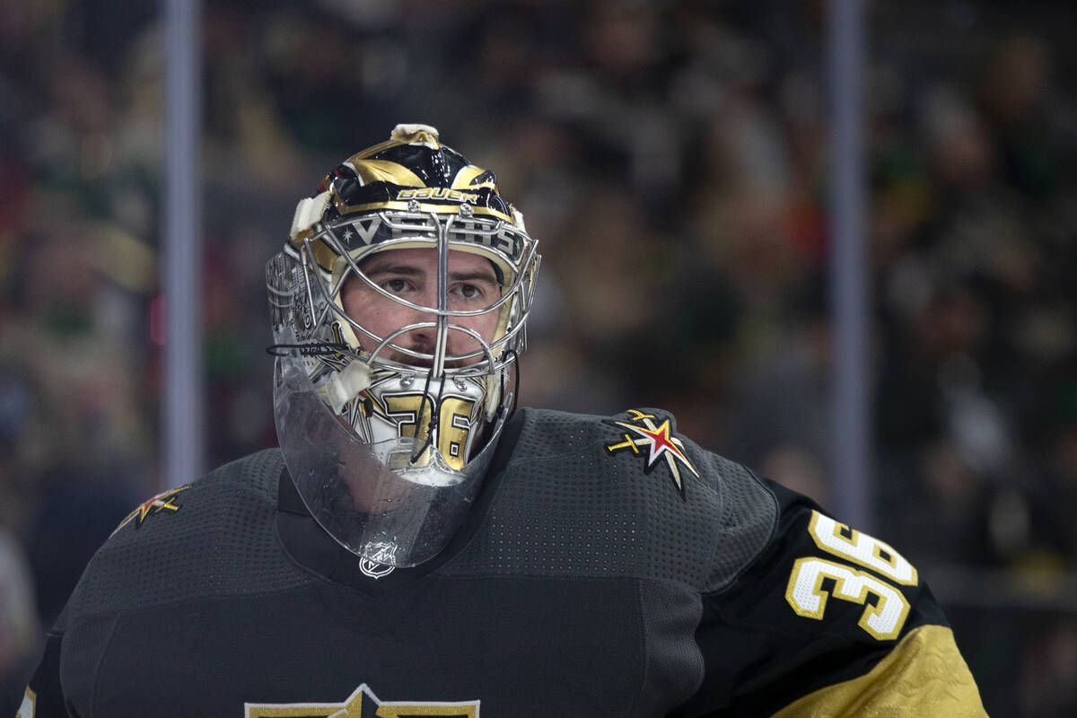 Golden Knights goaltender Logan Thompson (36) skates around the net during the second period of ...