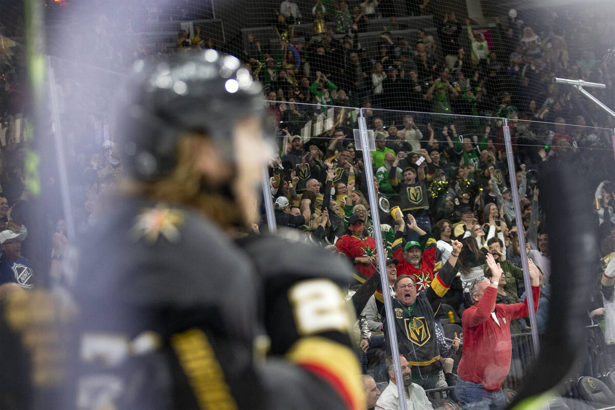 Golden Knights fans cheer in the background as Golden Knights center William Karlsson (71) cele ...