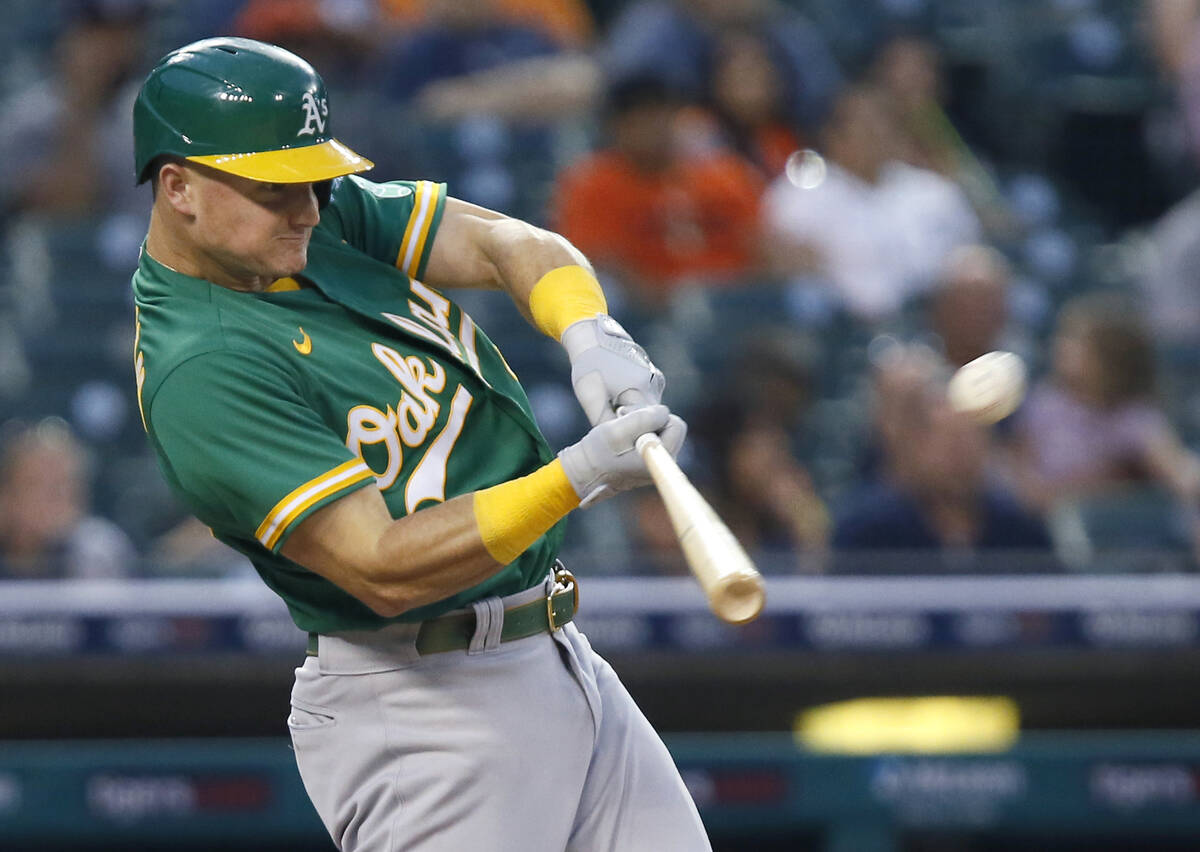 Oakland Athletics' Matt Chapman hits a two-run home run against the Detroit Tigers during a bas ...