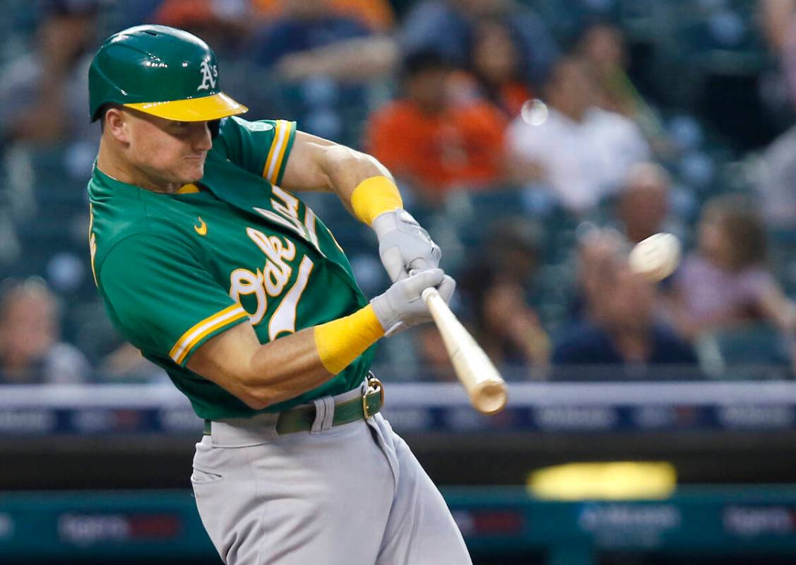 Oakland Athletics' Matt Chapman hits a two-run home run against the Detroit Tigers during a bas ...