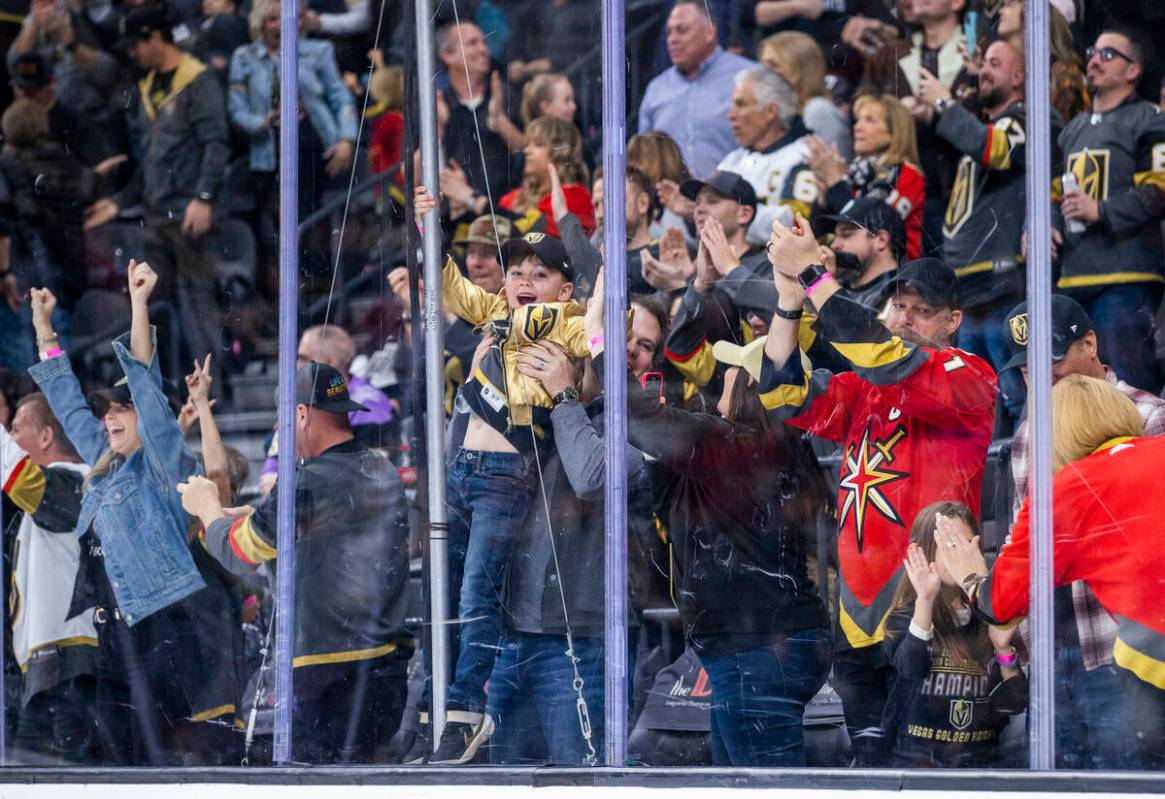 Golden Knights fans celebrate another score over the Los Angeles Kings during the third period ...