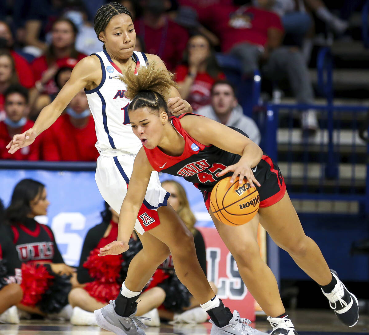 UNLV forward Nneka Obiazor (45) reacts alter being fouled by Arizona forward Sam Thomas (14) du ...