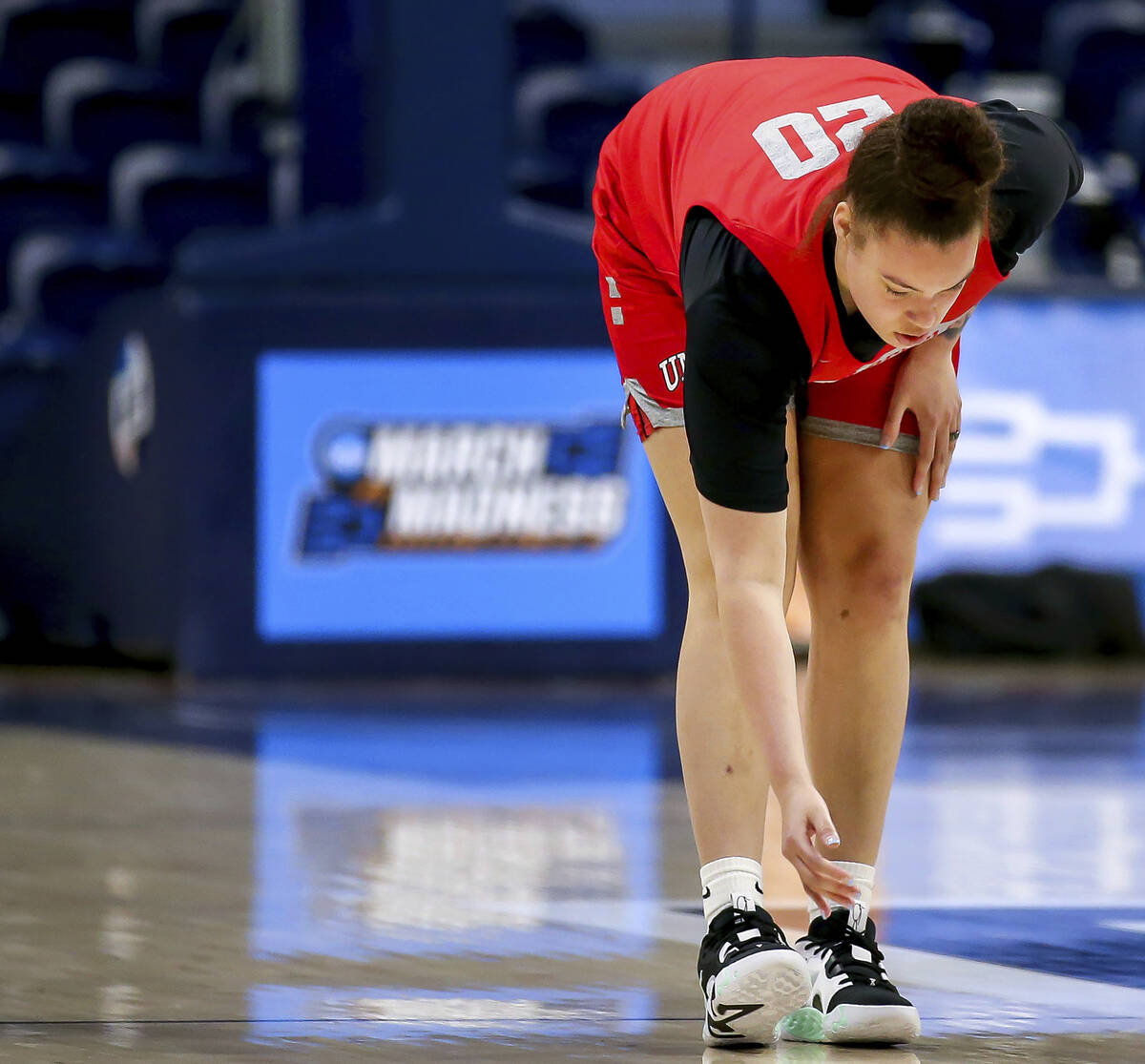 UNLV forward Khayla Rooks (20) stretches during practice for the NCAA women's college basketbal ...