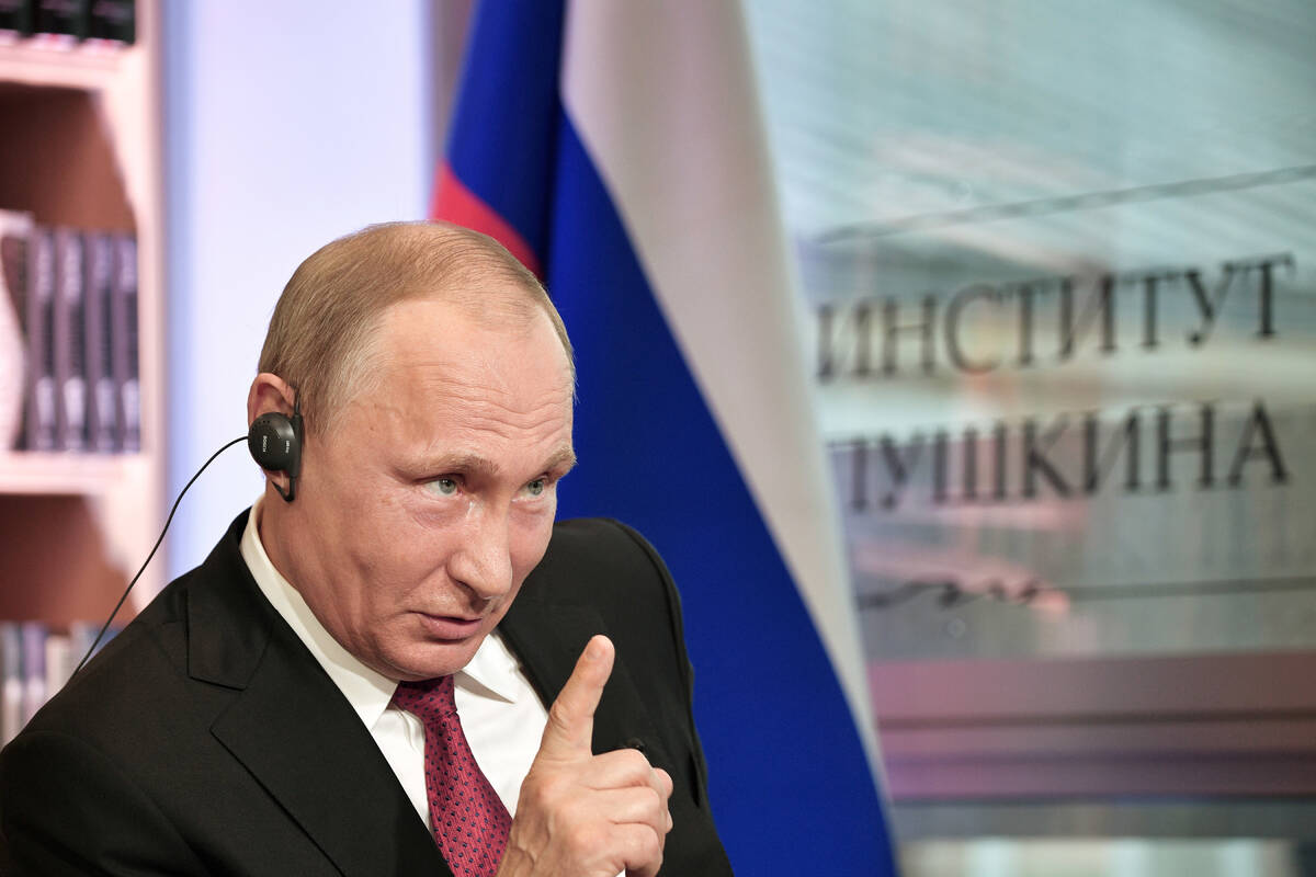 Russian President Vladimir Putin speaks during an interview in Paris last year. (Alexei Nikolsk ...