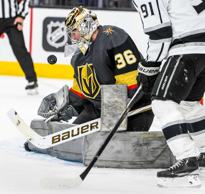 Golden Knights goaltender Logan Thompson (36) looks to grab a puck shot with the Los Angeles Ki ...