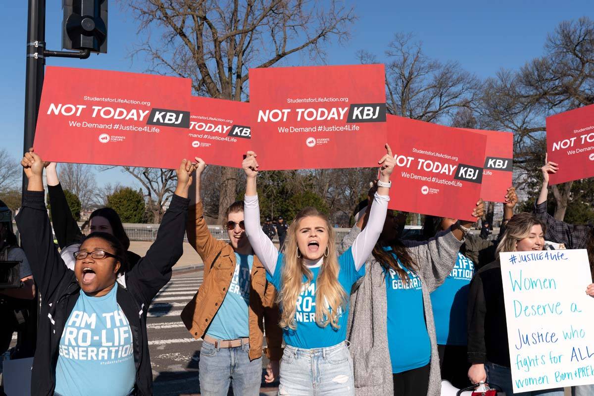 People who oppose the confirmation of Judge Ketanji Brown Jackson rally outside of the Supreme ...