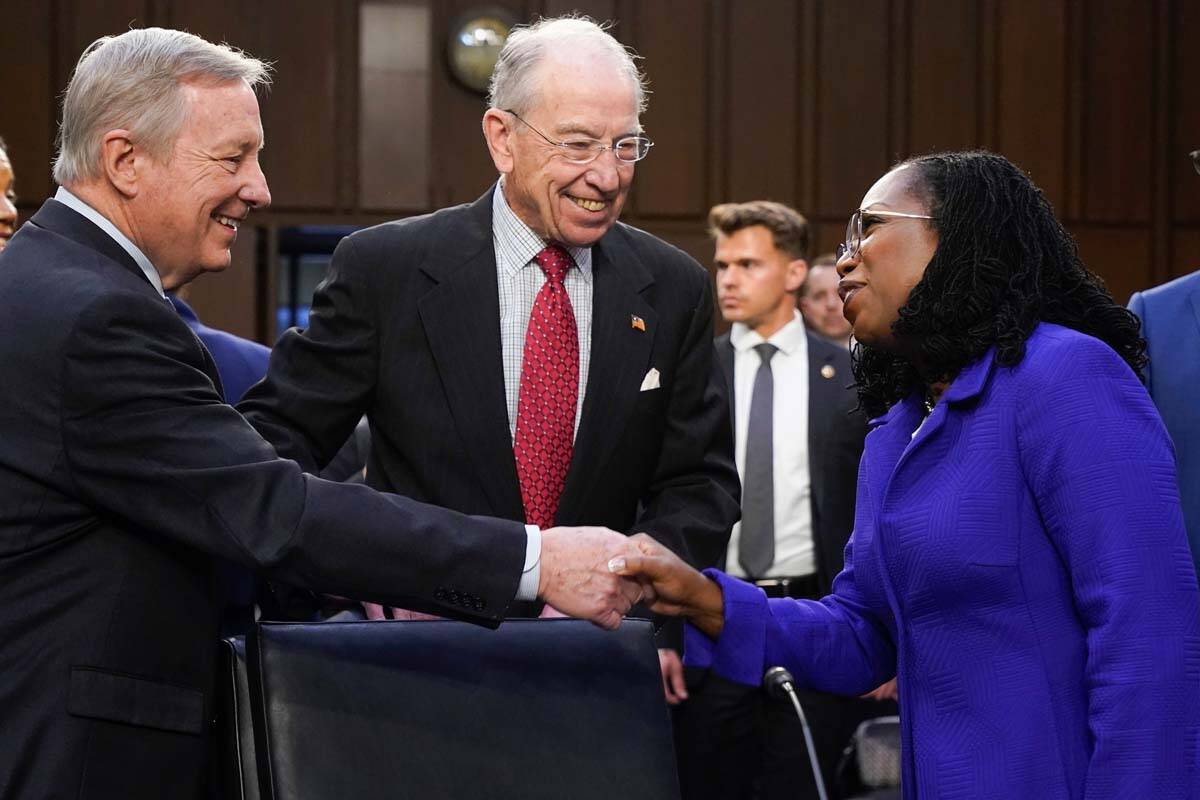 Supreme Court nominee Judge Ketanji Brown Jackson greets Sen. Dick Durbin, D-Ill., chairman of ...