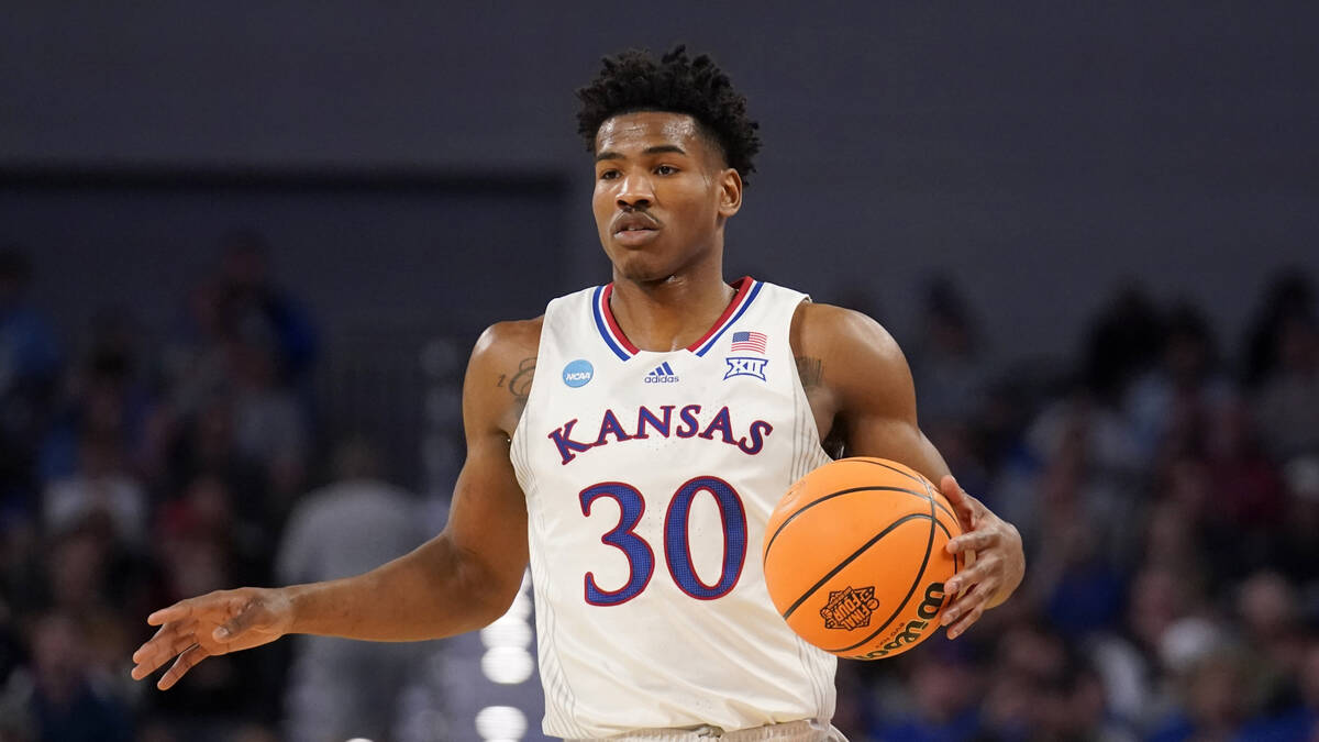 Kansas guard Ochai Agbaji handles the ball during a second-round game against Creighton in the ...