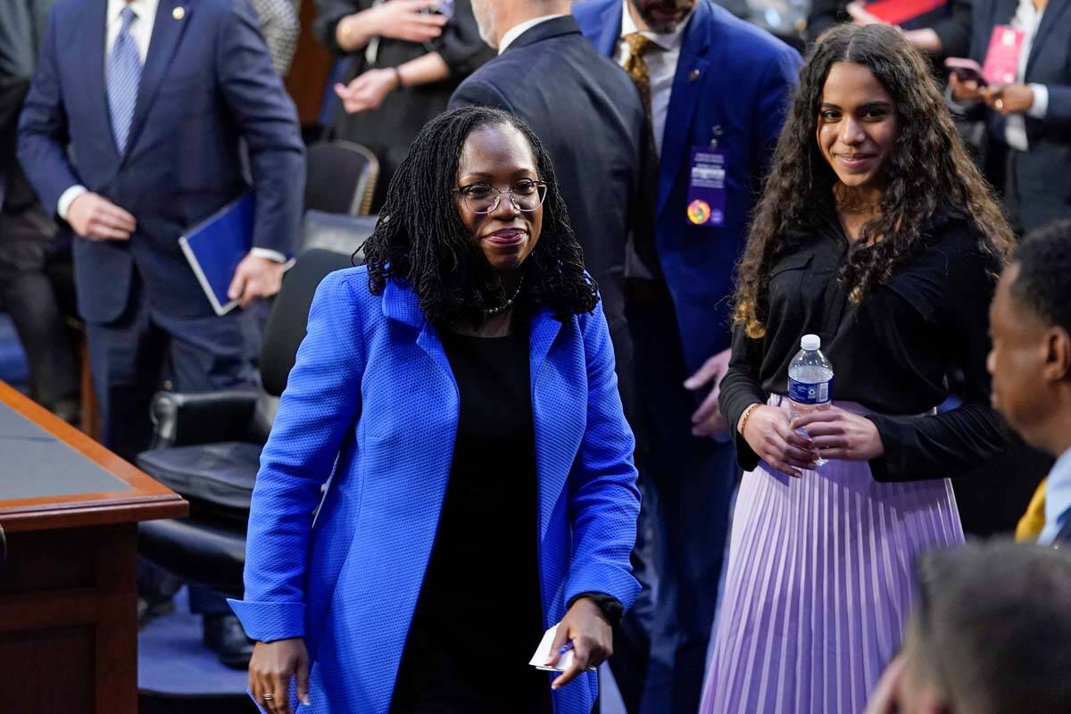 Supreme Court nominee Judge Ketanji Brown Jackson gets up at the conclusion of her confirmation ...