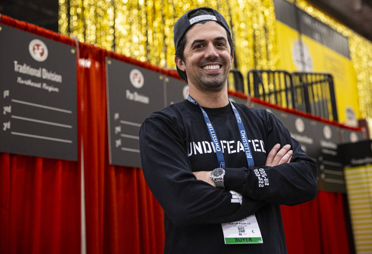 Michael Vakneen, co-creator of Pop Up Pizza, poses for a portrait during the International Pizz ...