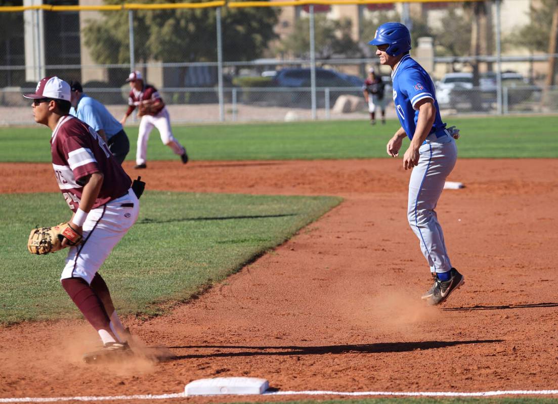 Bishop Gorman first baseman Tai Nguyen (17) keeps an eye on the bases behind Cimarron-Memorial' ...