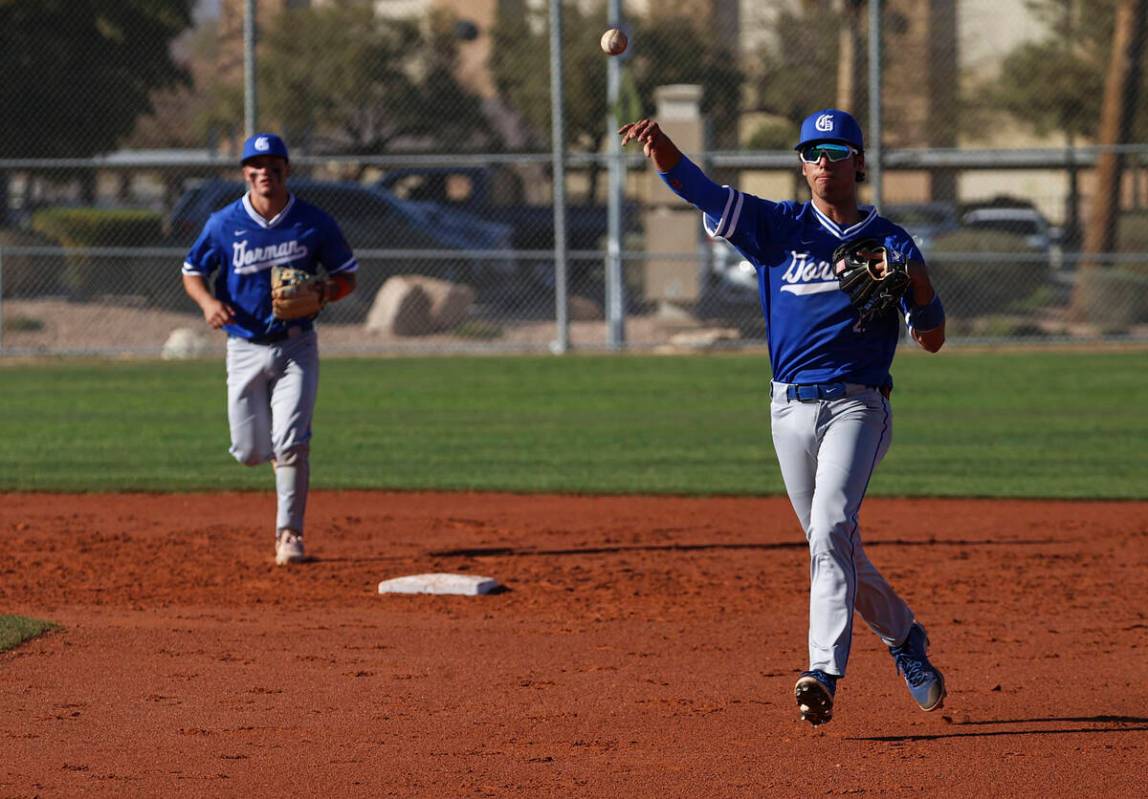 Bishop Gorman second baseman Maddox Riske (2) throws the ball to first baseman Easton Shelton ( ...