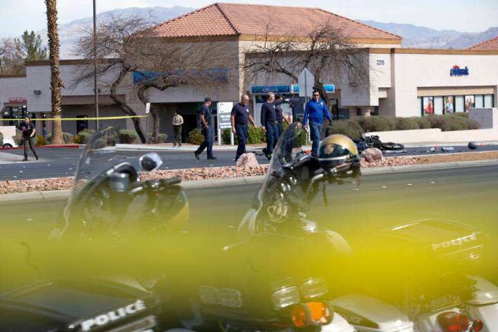 Las Vegas police and Las Vegas Fire Department attend to the scene where a motorcyclist died in ...