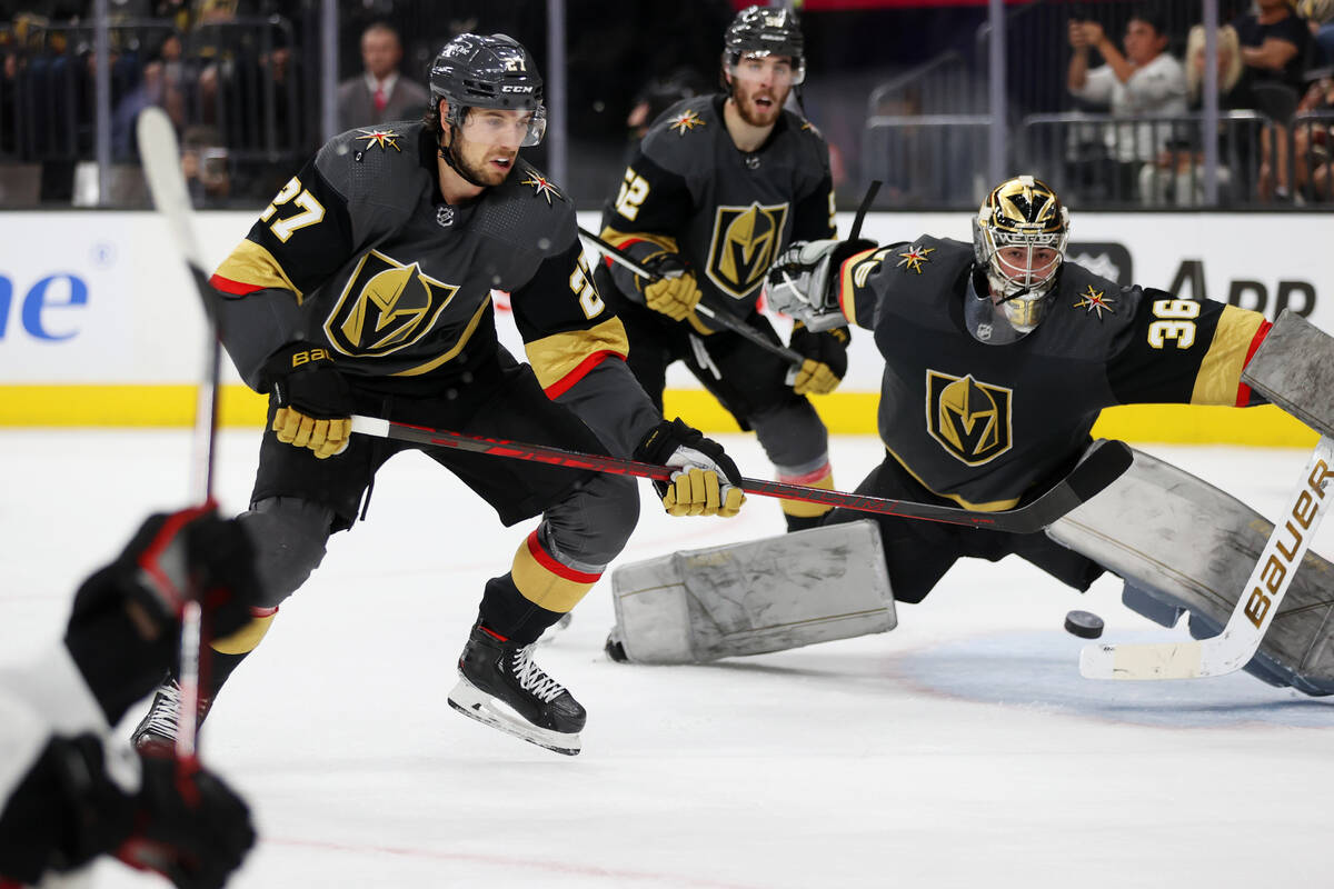 Chicago Blackhawks center Dylan Strome (17) shoots a puck for a score as Vegas Golden Knights d ...