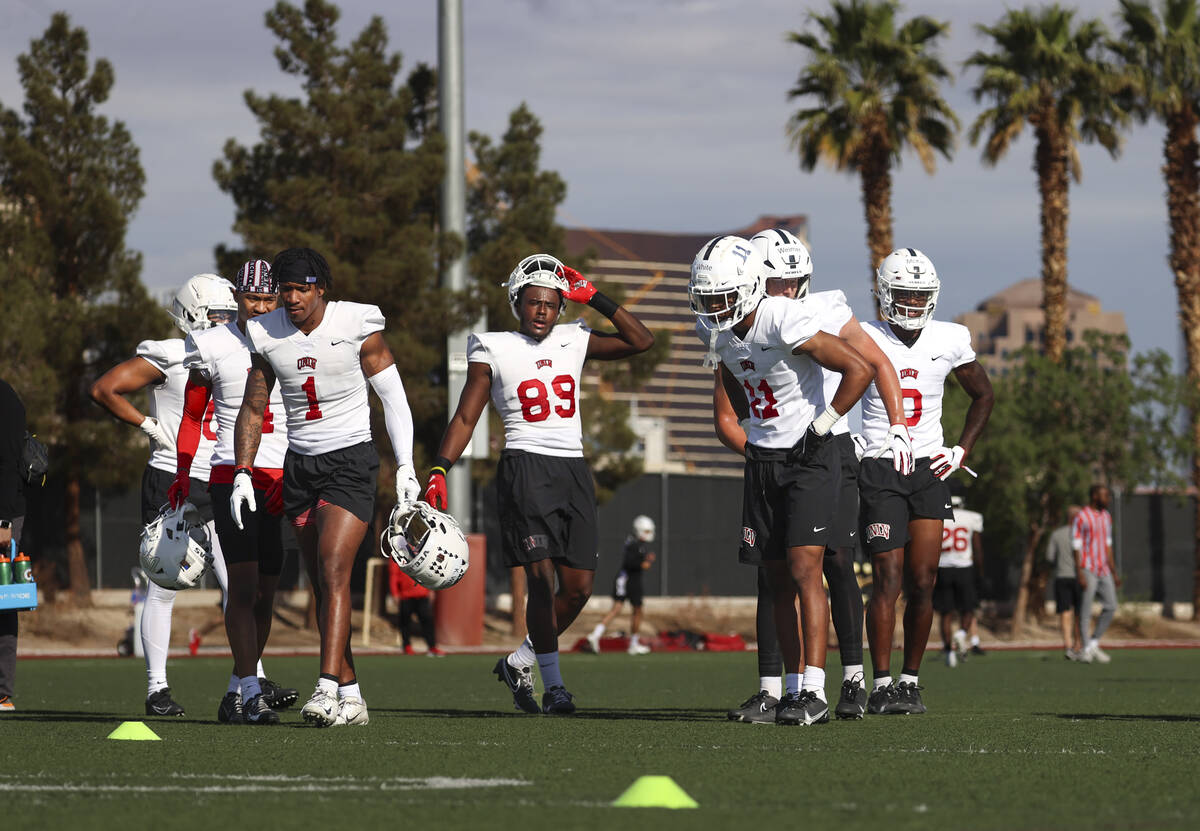UNLV Rebels wide receivers look on during the first day of spring football practice on Tuesday, ...