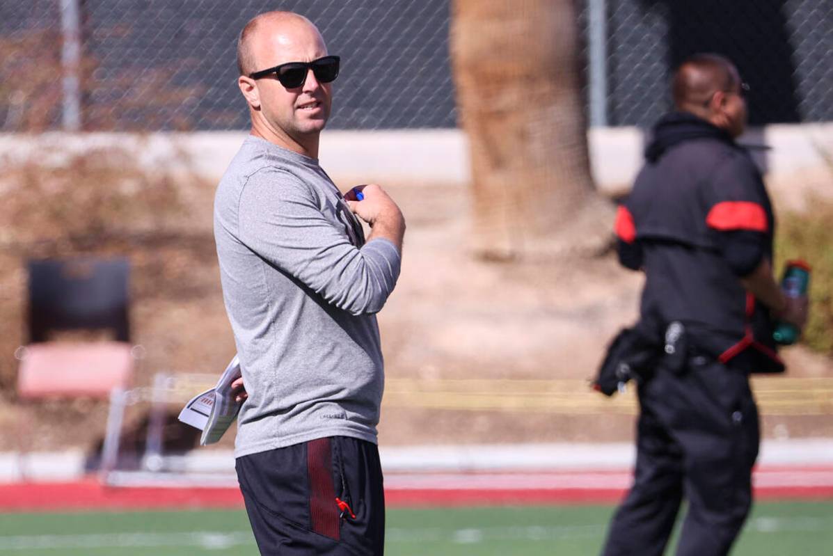 UNLV Rebels offensive coordinator Nick Holz looks on during the first day of spring football pr ...