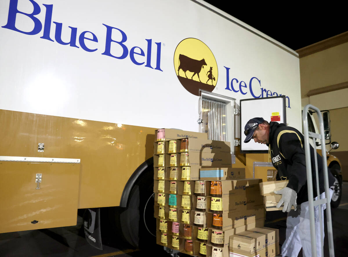 Blue Bell Ice Cream driver Jason Goens loads product at an Albertsons grocery store in Henderso ...