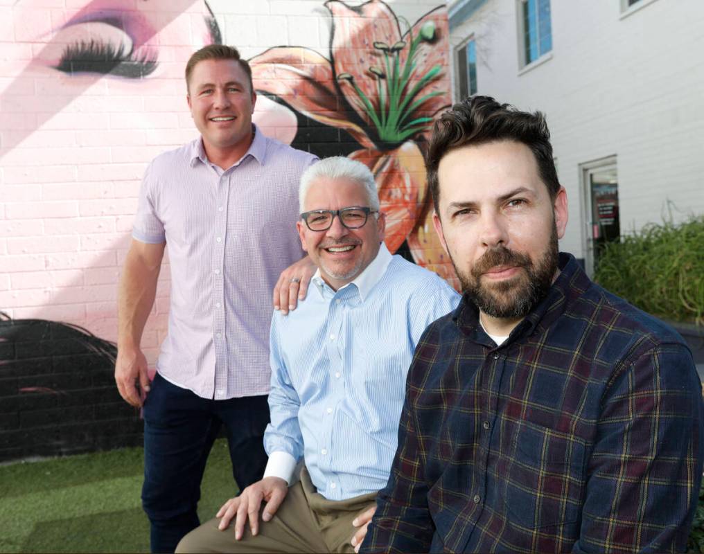 Dinette representatives, Trent Jones, from left, Nick A. Della Penna and Jerad Howard, pose for ...