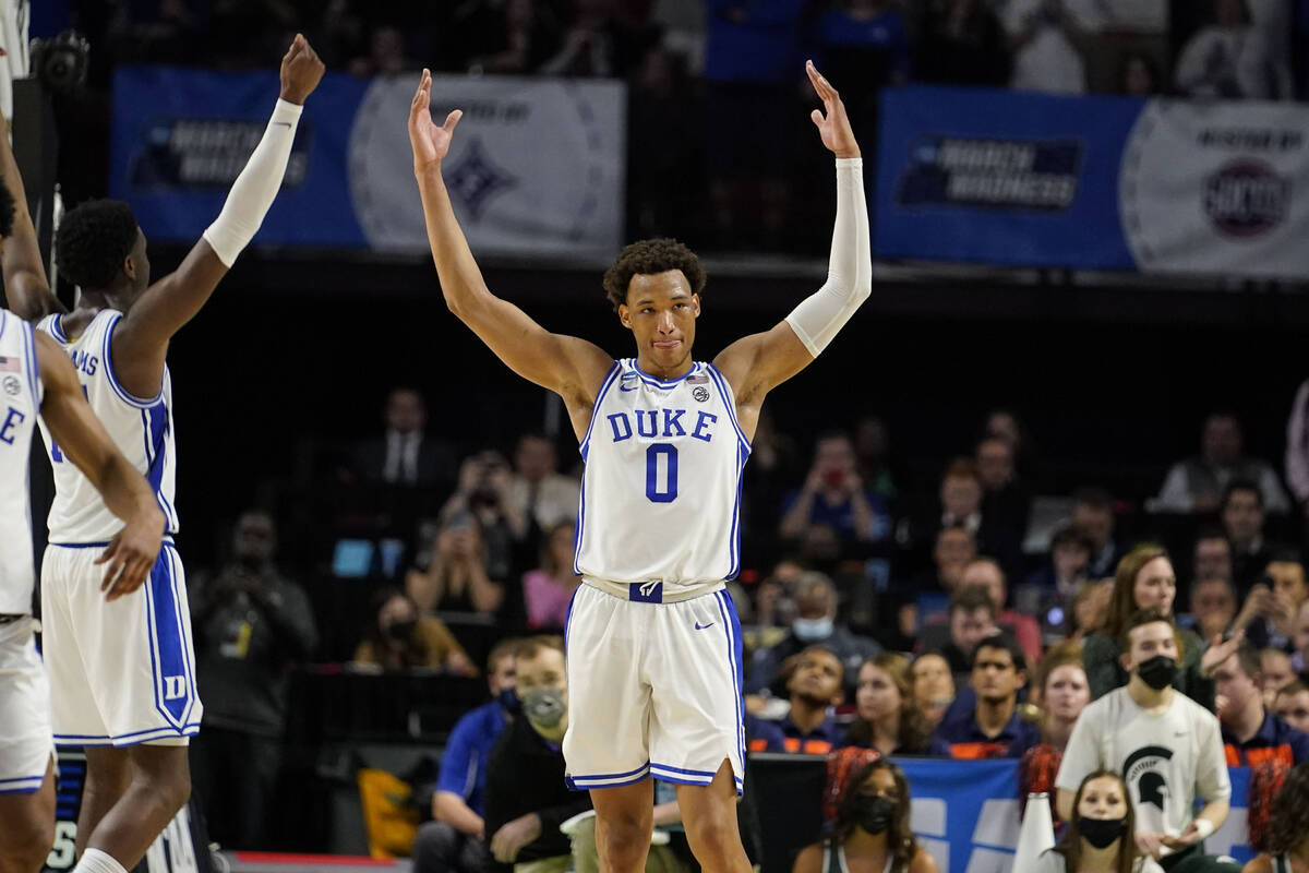 Duke's Wendell Moore Jr. (0) celebrates after a win against Michigan State in a college basketb ...