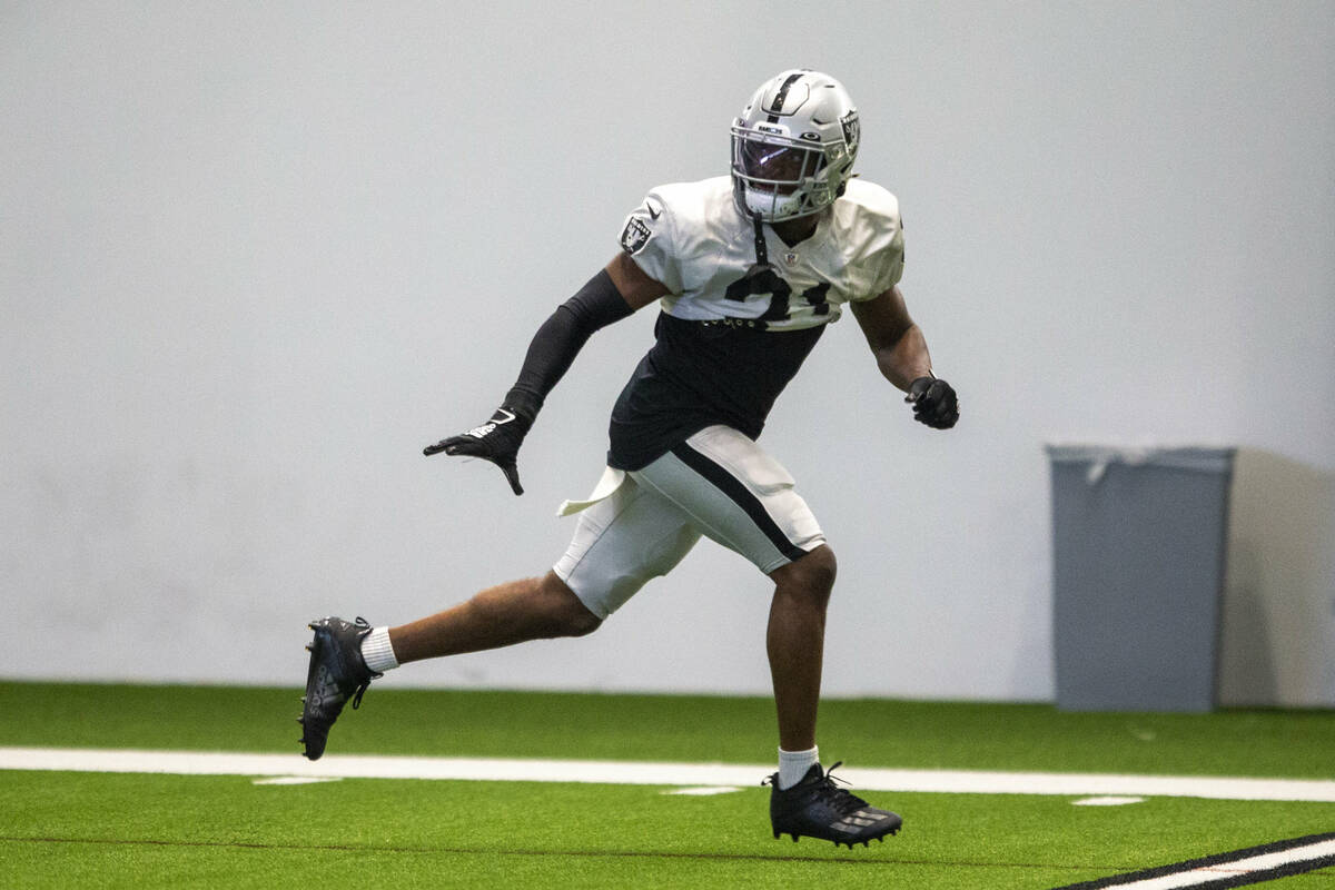 Raiders cornerback Amik Robertson (21) runs through a drill during team practice at the Raiders ...