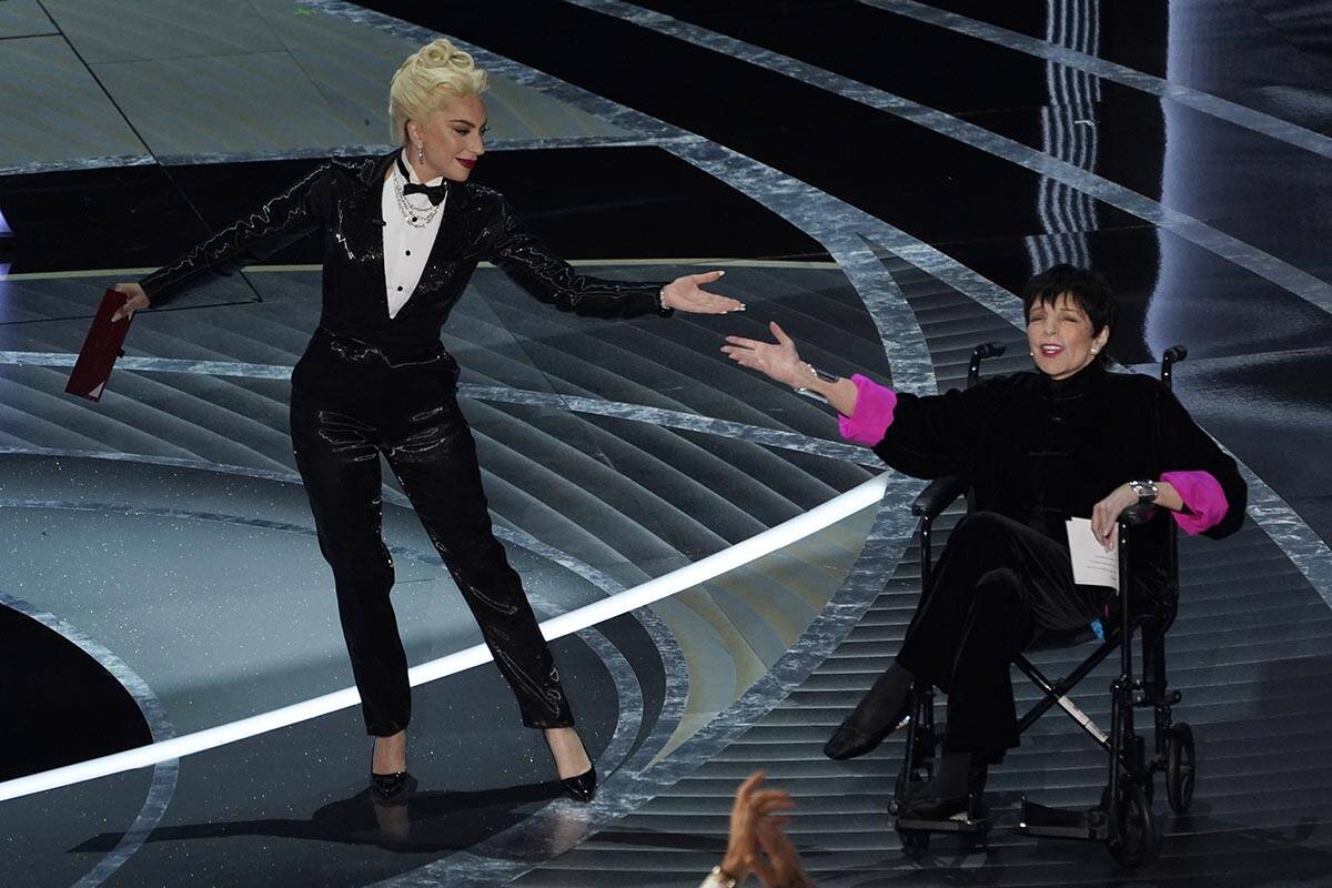 Lady Gaga, left, and Liza Minnelli present the award for best picture at the Oscars on Sunday, ...