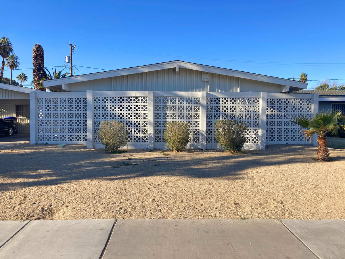 Breeze blocks are the patterned concrete blocks covering the sides of a building or stacked upo ...