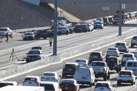 A segment of the 215 Beltway is closed as the Nevada Highway Patrol investigate a fatal crash o ...