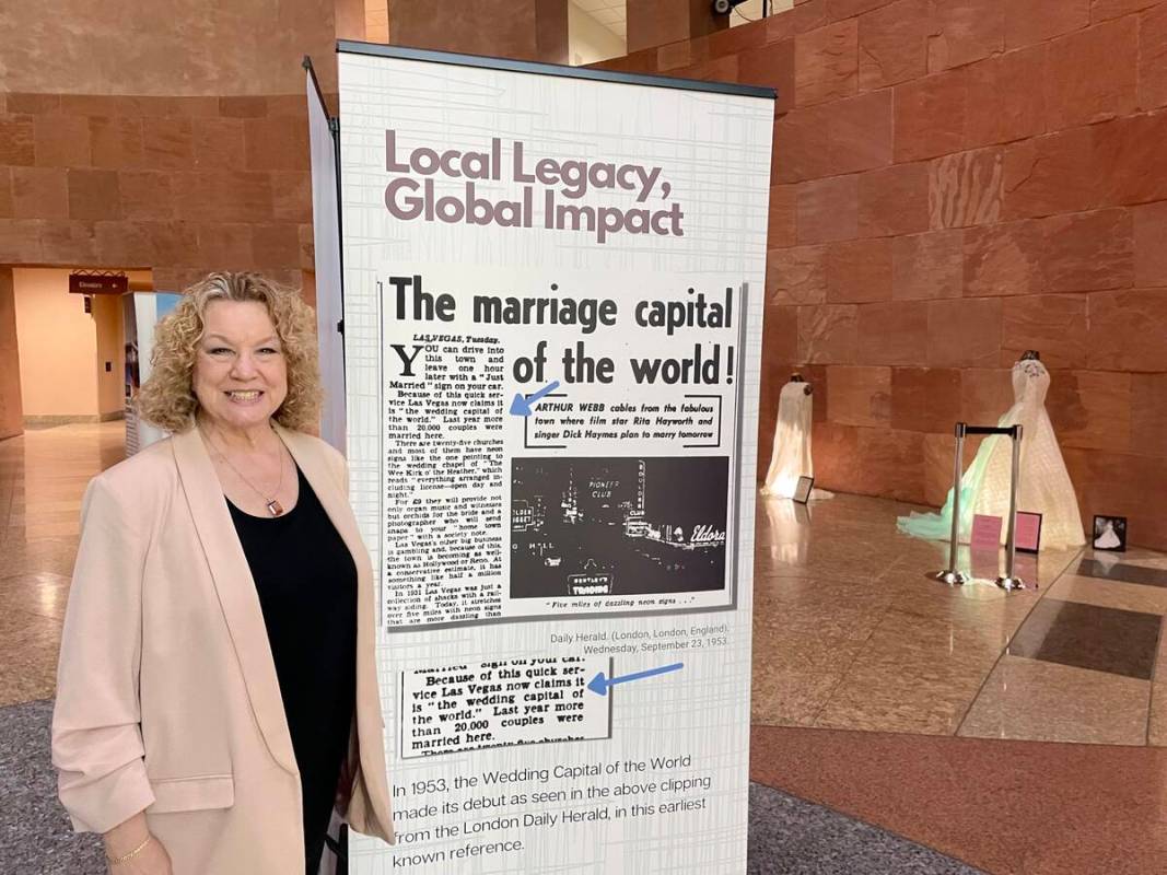 Clark County Clerk Lynn Marie Goya poses for a photo with information about the first known ref ...