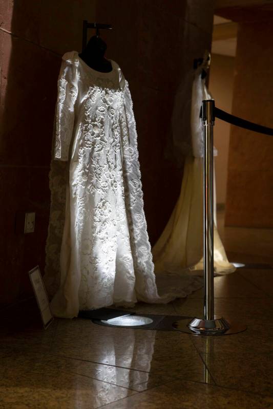 A vintage wedding dress is on display as part of a historical wedding exhibit in the rotunda at ...