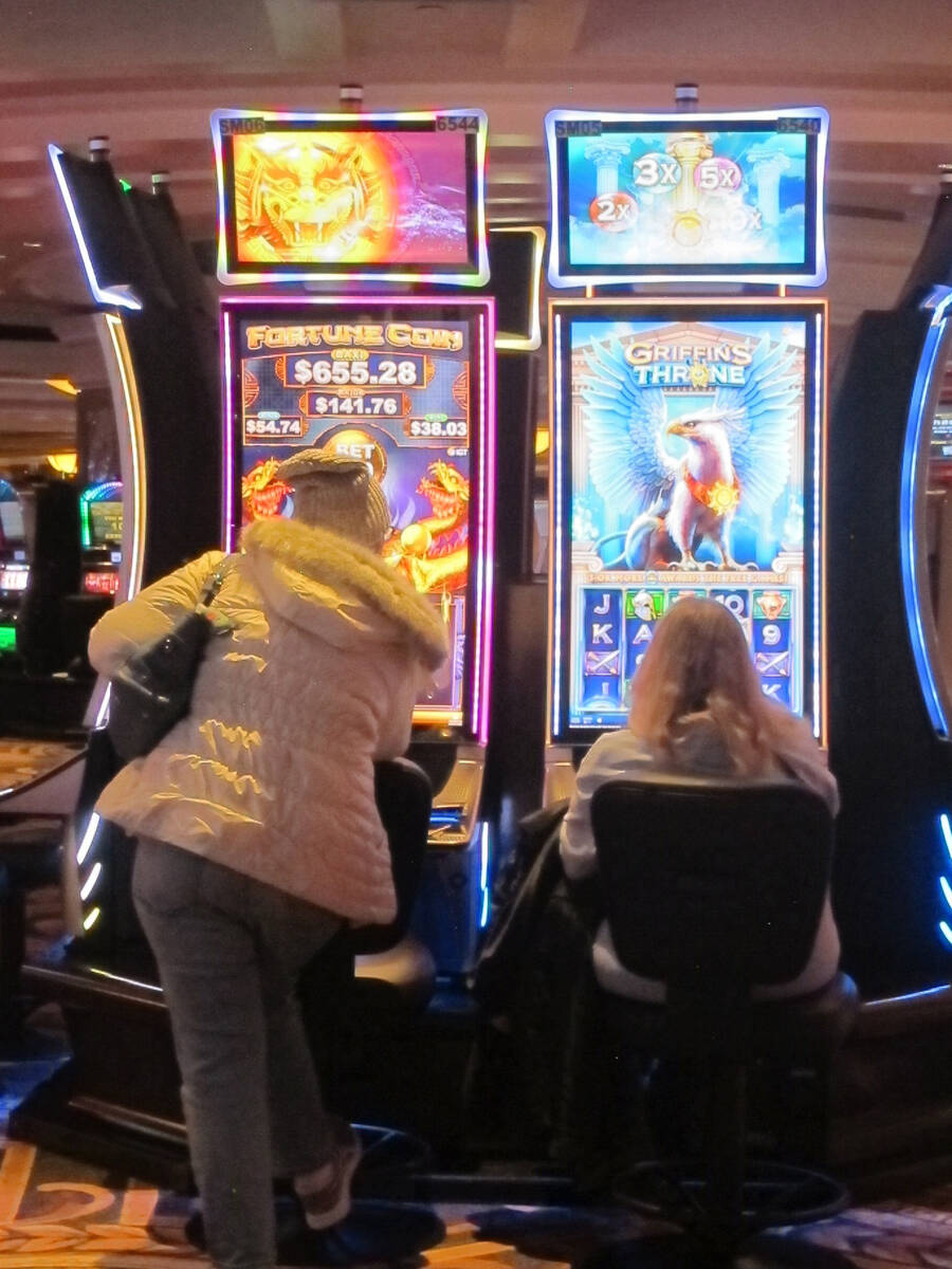 This Jan. 27, 2022, photo shows gamblers playing a slot machines at Caesars casino in Atlantic ...