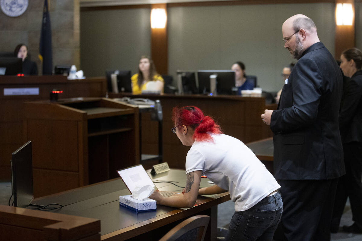 Jasmin Vargas, left, with her defense attorney, Augustus Claus, speaks in court during her sent ...