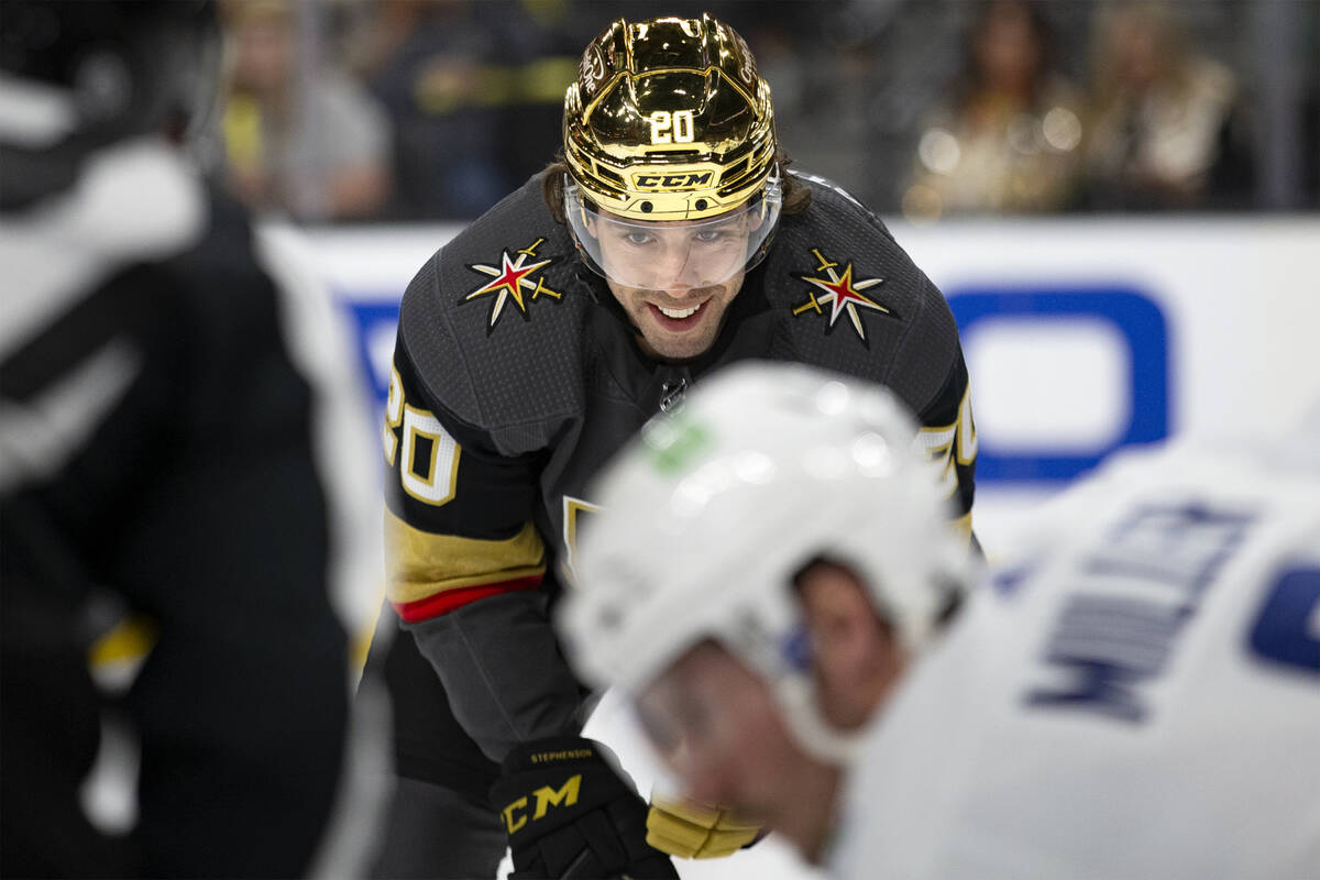 Golden Knights center Chandler Stephenson (20) smiles while waiting for the puck to drop in a f ...